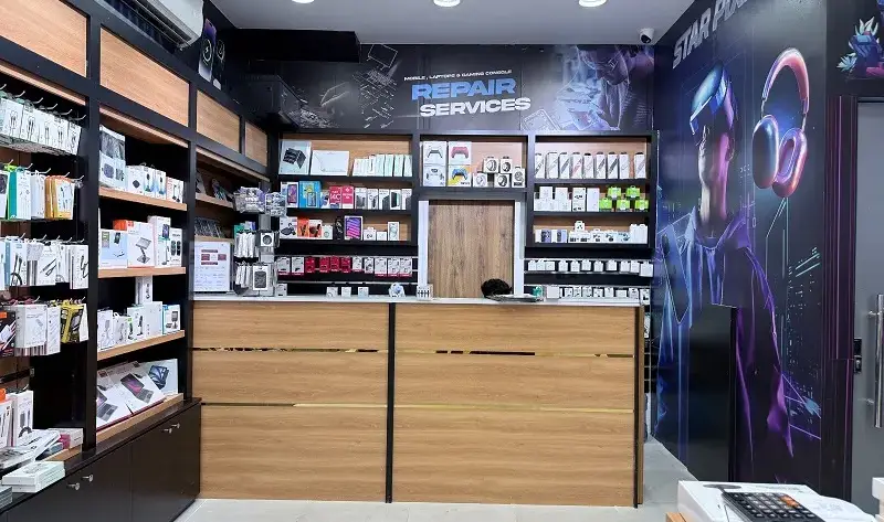 Trade-in phones in Qatar at Star Pixel Umm Al Seneem inside Woqood petrol station